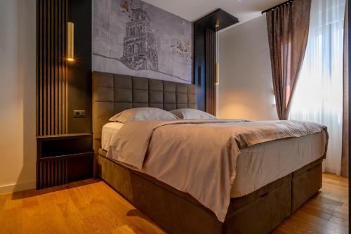a bedroom with a large bed in a room at Luxury Apartment Cocco - Split in Split