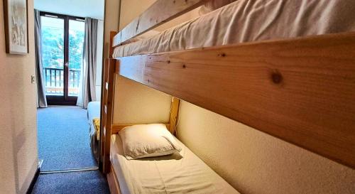 Ένα ή περισσότερα κρεβάτια σε δωμάτιο στο Résidence Sirius - maeva Home - Studio 4 personnes - Confort MAE-3731