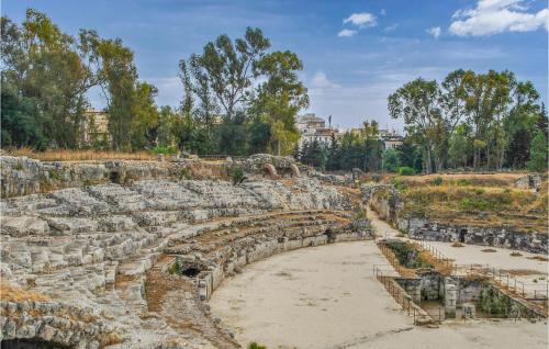 an amphitheatre in the ruins of the ancient city at Lovely Home In Palazzolo Acreide in Palazzolo Acreide