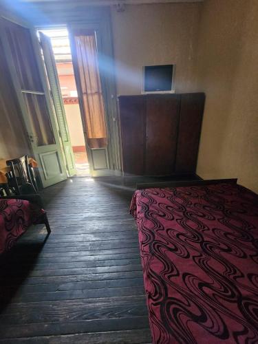 Телевизор и/или развлекательный центр в Hotel Pueyrredón