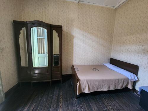 Кровать или кровати в номере Hotel Pueyrredón