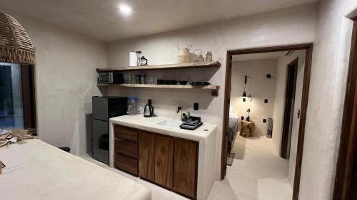 Η κουζίνα ή μικρή κουζίνα στο Hábitat Nandá