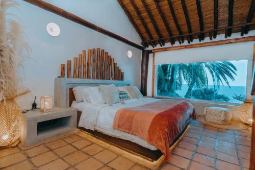 Llit o llits en una habitació de Rancho Victorio