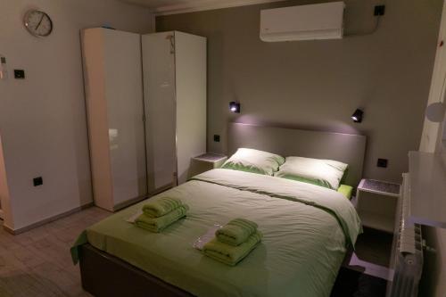 Ένα ή περισσότερα κρεβάτια σε δωμάτιο στο Studio Apartment-Horizont 47