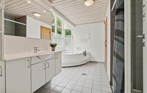 Un baño de Rubinsøen Skovhuse