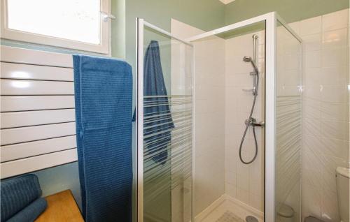 a bathroom with a shower with a glass door at Beautiful Home In Die in Die