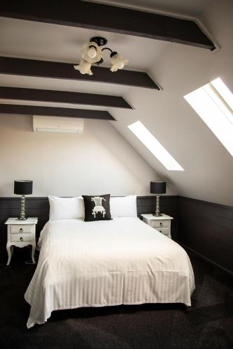Postel nebo postele na pokoji v ubytování Brigham House