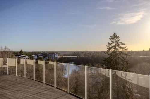 a view from the balcony of the house at Luxury Villa - Private Pool and Lake View in Nacka