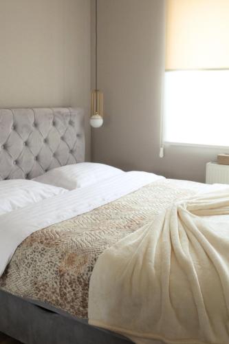 Cama o camas de una habitación en Apartman Samsara
