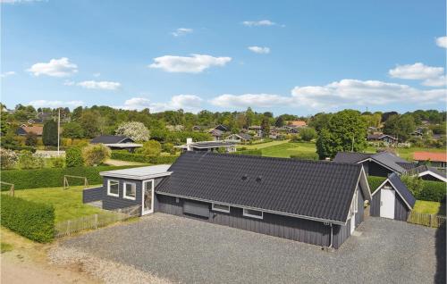 an overhead view of a house with a roof at Gorgeous Home In Hejls With Wifi in Hejls