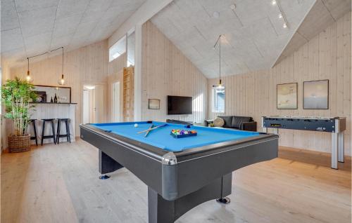 a large room with a pool table in it at Nice Home In Sydals With Kitchen in Sarup