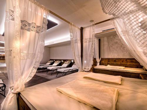 Posteľ alebo postele v izbe v ubytovaní Hotel Universo
