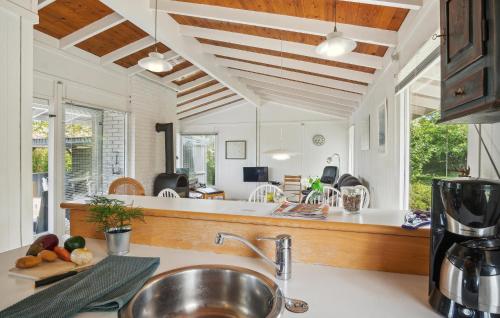 a kitchen with a sink and a counter top at 3 Bedroom Nice Home In Slagelse in Slagelse