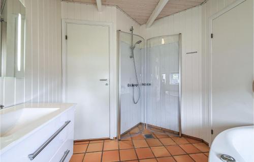 a bathroom with a shower and a sink at Holiday Home Juelsminde With A Fireplace 09 in Juelsminde