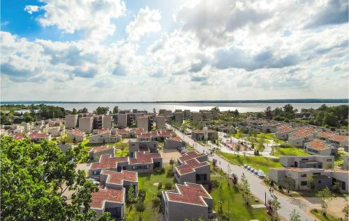 an aerial view of a city with houses and the water at Gorgeous Home In Lembruchdümmer See in Lembruch