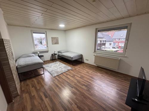 Postel nebo postele na pokoji v ubytování Schelder Gästezimmer