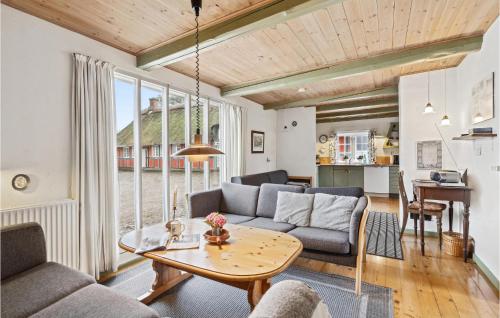 a living room with a couch and a table at Amazing Apartment In Faaborg With Wifi in Faaborg