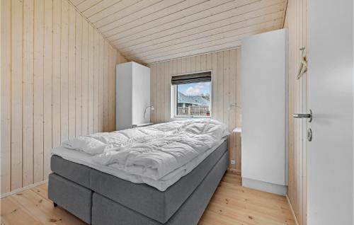 a large bed in a room with a window at Nice Home In Kalundborg With Wifi in Kalundborg