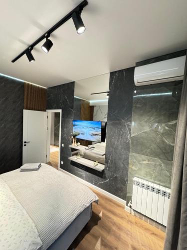 Ένα ή περισσότερα κρεβάτια σε δωμάτιο στο RentNow New Lux Business Apartment in the Center