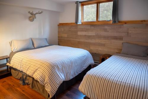 Ein Bett oder Betten in einem Zimmer der Unterkunft Le 583 Stoneham CITQ#239,960