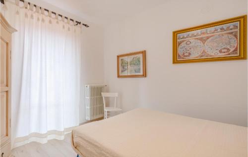 Postel nebo postele na pokoji v ubytování Casa Tomeoni