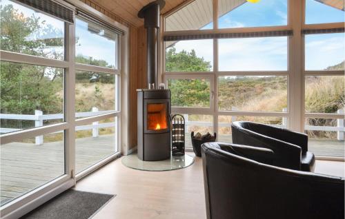 Posezení v ubytování Holiday Home Henne With A Fireplace 08