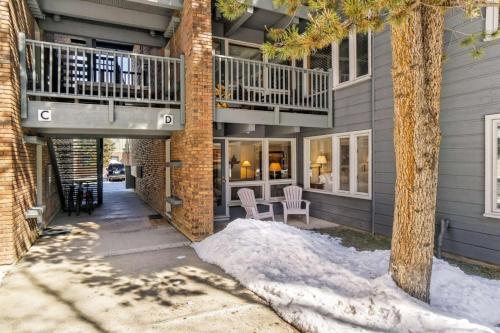 a house with a deck and a balcony at Cottonwoods 1-D in Aspen
