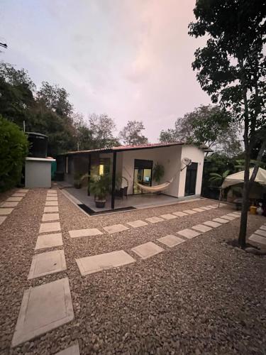 アプロにあるCondominio la Orquídea - Apuloの庭中家