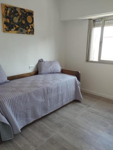 Ένα ή περισσότερα κρεβάτια σε δωμάτιο στο Boutique Rawson