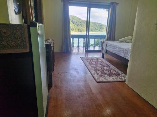 Ένα ή περισσότερα κρεβάτια σε δωμάτιο στο Sea view clif cabin kantiang bay