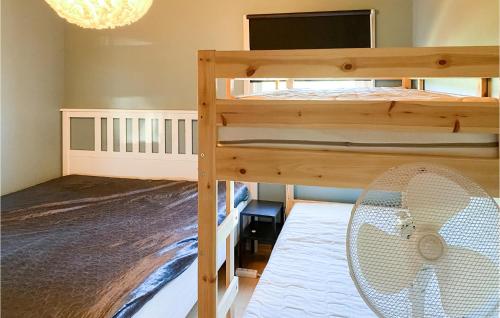 Stunning Home In Kalmar With Kitchenにあるベッド