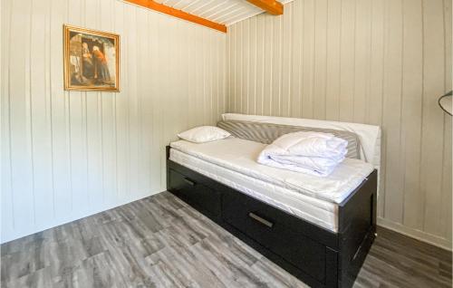 a small room with a small bed in the corner at Nice Home In Älvsered With Wifi in Älvsered