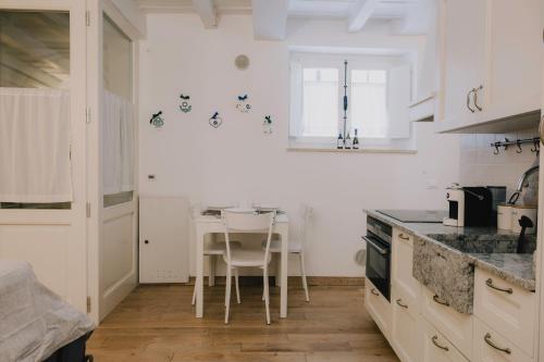 Η κουζίνα ή μικρή κουζίνα στο Love Home Veronetta