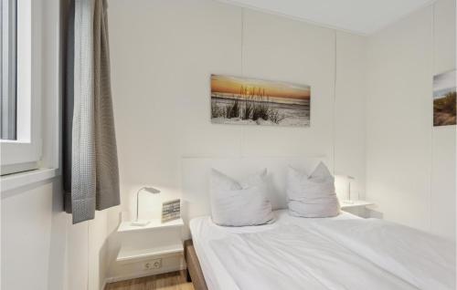 Ένα ή περισσότερα κρεβάτια σε δωμάτιο στο Chalet 34 Am See