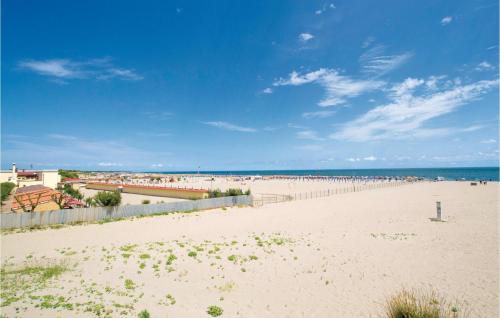 a beach with a lot of people on it at Pigne in Rosolina Mare
