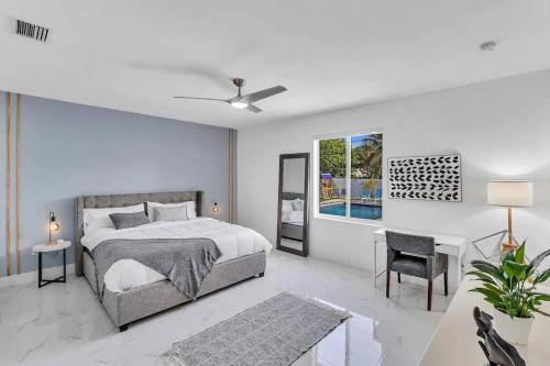 Ένα ή περισσότερα κρεβάτια σε δωμάτιο στο Miami Resort Villa