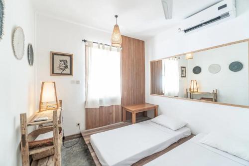Ένα ή περισσότερα κρεβάτια σε δωμάτιο στο Villa Tortoise by Bukit Vista