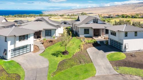 an aerial view of a house at MAUNA KEA BEACH ESCAPE Luxurious home in private community with Heated Private Pool and Spa Detached Ohana Suite in Waimea