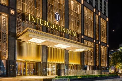 a building with a sign on the front of it at InterContinental Kaohsiung by IHG in Kaohsiung