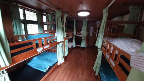 Postel nebo postele na pokoji v ubytování Kerama Backpackers