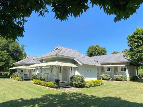 Un jardín fuera de Phutawan Pundao