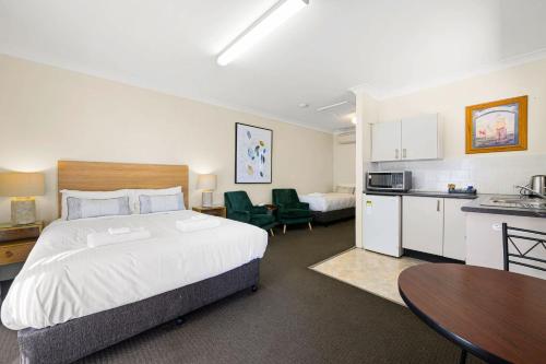 Dapur atau dapur kecil di Melview Greens - Studio Apartment