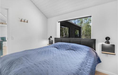Ένα ή περισσότερα κρεβάτια σε δωμάτιο στο 4 Bedroom Lovely Home In Nexø