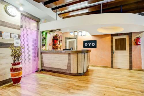 a lobby with a bar in a building at Super Collection O Harsh Regency in Rānchī