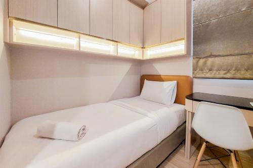 Postel nebo postele na pokoji v ubytování Scenic and Restful 2BR Sky House BSD Apartment By Travelio