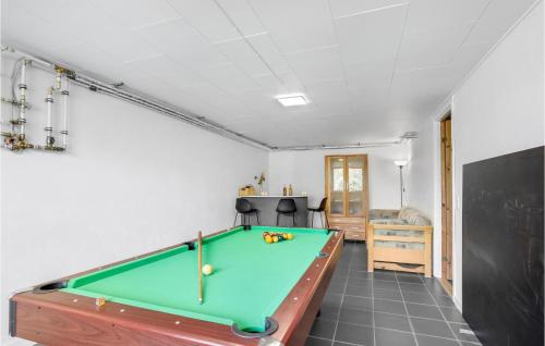 a room with a pool table in it at 5 Bedroom Lovely Home In Allinge in Allinge