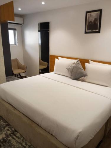 Cama o camas de una habitación en Enzo Apartments