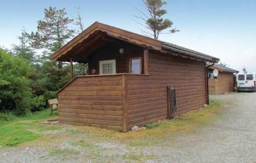 a small wooden building with a small window at Beautiful Home In Kleppe With Wifi in Bore