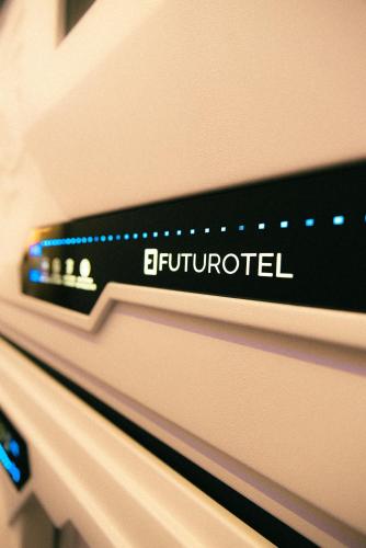 a close up of the front of an oven with the word bur conducted at Futurotel Sevilla in Seville