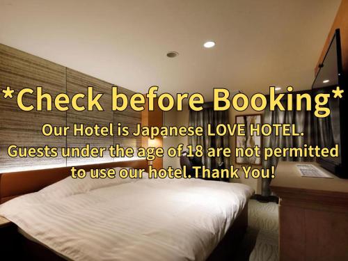 a sign that reads check before booking at Hotel ValentineTogo (Adult Only) in Togo
